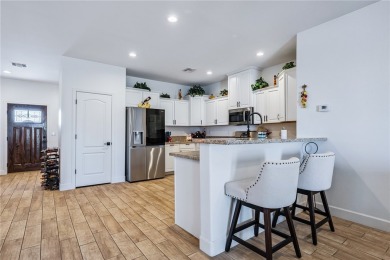 Gorgeous 2022-built home located on the Hukan Golf Course in the on Desert Lakes Golf Course in Arizona - for sale on GolfHomes.com, golf home, golf lot