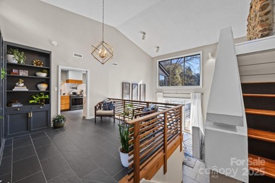 Discover this exceptional end-unit townhome, offering an on Raintree Country Club in North Carolina - for sale on GolfHomes.com, golf home, golf lot