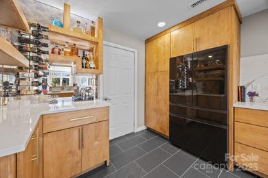Discover this exceptional end-unit townhome, offering an on Raintree Country Club in North Carolina - for sale on GolfHomes.com, golf home, golf lot