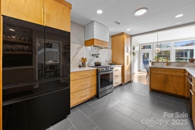 Discover this exceptional end-unit townhome, offering an on Raintree Country Club in North Carolina - for sale on GolfHomes.com, golf home, golf lot