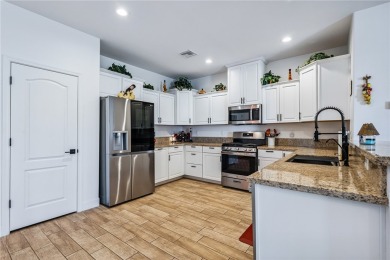 Gorgeous 2022-built home located on the Hukan Golf Course in the on Desert Lakes Golf Course in Arizona - for sale on GolfHomes.com, golf home, golf lot