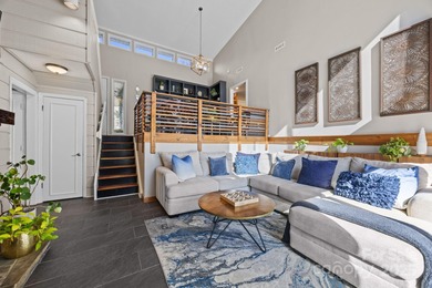 Discover this exceptional end-unit townhome, offering an on Raintree Country Club in North Carolina - for sale on GolfHomes.com, golf home, golf lot