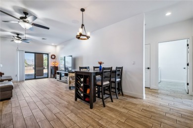 Gorgeous 2022-built home located on the Hukan Golf Course in the on Desert Lakes Golf Course in Arizona - for sale on GolfHomes.com, golf home, golf lot