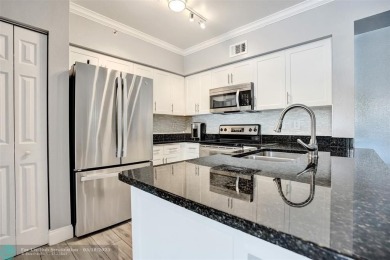 Welcome to this updated condo in Emerald Dunes, West Palm Beach on Emerald Dunes Golf Club in Florida - for sale on GolfHomes.com, golf home, golf lot