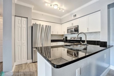 Welcome to this updated condo in Emerald Dunes, West Palm Beach on Emerald Dunes Golf Club in Florida - for sale on GolfHomes.com, golf home, golf lot