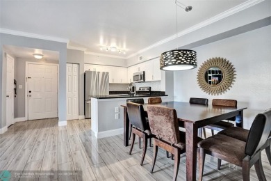 Welcome to this updated condo in Emerald Dunes, West Palm Beach on Emerald Dunes Golf Club in Florida - for sale on GolfHomes.com, golf home, golf lot
