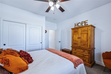 Gorgeous 2022-built home located on the Hukan Golf Course in the on Desert Lakes Golf Course in Arizona - for sale on GolfHomes.com, golf home, golf lot