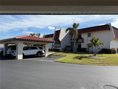 Second floor 2 Bedroom, 2 Bathroom condo with assigned covered on Saint Andrews South Golf Club in Florida - for sale on GolfHomes.com, golf home, golf lot