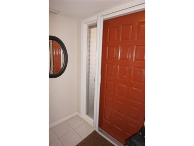 Second floor 2 Bedroom, 2 Bathroom condo with assigned covered on Saint Andrews South Golf Club in Florida - for sale on GolfHomes.com, golf home, golf lot