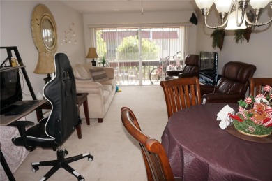 Second floor 2 Bedroom, 2 Bathroom condo with assigned covered on Saint Andrews South Golf Club in Florida - for sale on GolfHomes.com, golf home, golf lot
