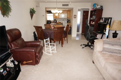 Second floor 2 Bedroom, 2 Bathroom condo with assigned covered on Saint Andrews South Golf Club in Florida - for sale on GolfHomes.com, golf home, golf lot