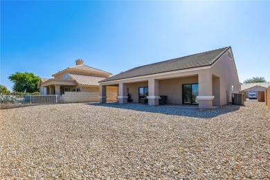 Gorgeous 2022-built home located on the Hukan Golf Course in the on Desert Lakes Golf Course in Arizona - for sale on GolfHomes.com, golf home, golf lot