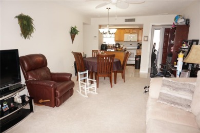 Second floor 2 Bedroom, 2 Bathroom condo with assigned covered on Saint Andrews South Golf Club in Florida - for sale on GolfHomes.com, golf home, golf lot