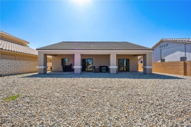 Gorgeous 2022-built home located on the Hukan Golf Course in the on Desert Lakes Golf Course in Arizona - for sale on GolfHomes.com, golf home, golf lot