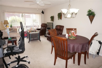 Second floor 2 Bedroom, 2 Bathroom condo with assigned covered on Saint Andrews South Golf Club in Florida - for sale on GolfHomes.com, golf home, golf lot