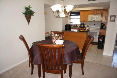 Second floor 2 Bedroom, 2 Bathroom condo with assigned covered on Saint Andrews South Golf Club in Florida - for sale on GolfHomes.com, golf home, golf lot