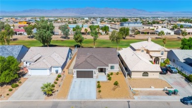 Gorgeous 2022-built home located on the Hukan Golf Course in the on Desert Lakes Golf Course in Arizona - for sale on GolfHomes.com, golf home, golf lot