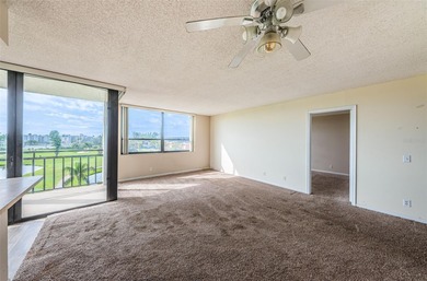 Relaxation in Paradise. The first thing to appreciate when on Isla Del Sol Yacht and Country Club in Florida - for sale on GolfHomes.com, golf home, golf lot