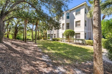 Gorgeous, bright, first floor, 3/2 end-unit with serene preserve on Bonita Bay West in Florida - for sale on GolfHomes.com, golf home, golf lot