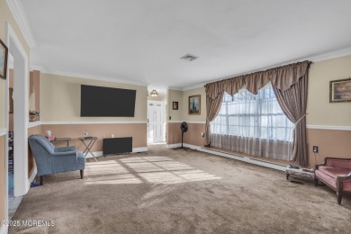 This popular Baronet is in move in condition. Situated one block on Greenbriar Woodlands in New Jersey - for sale on GolfHomes.com, golf home, golf lot