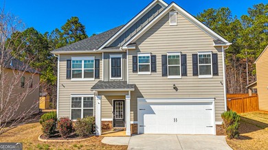 Welcome to this beautifully updated 5-bedroom, 3-bath on Canongate At Heron Bay in Georgia - for sale on GolfHomes.com, golf home, golf lot