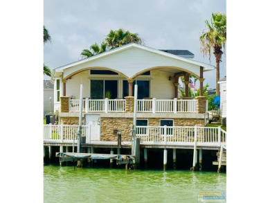 Welcome to 685 E Clam -a stunning 2/2 waterfront retreat in the on Long Island Golf Course in Texas - for sale on GolfHomes.com, golf home, golf lot