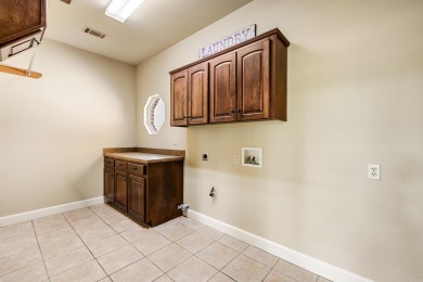 Stunning golf course home on the 11th hole of Longhills on Longhills Golf Club in Arkansas - for sale on GolfHomes.com, golf home, golf lot