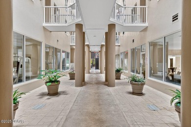 ENJOY COASTAL LIVING AT ITS BEST AT OCEANS CLOVERLEAF CONDO, A on Oceans Golf Club in Florida - for sale on GolfHomes.com, golf home, golf lot