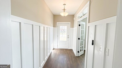 Welcome to this beautifully updated 5-bedroom, 3-bath on Canongate At Heron Bay in Georgia - for sale on GolfHomes.com, golf home, golf lot