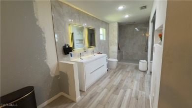 Handyman special in Cape Coral Florida. This 4-bedroom on Burnt Store Golf Club in Florida - for sale on GolfHomes.com, golf home, golf lot