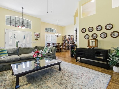 Imagine unwinding in a stunning  St. Simons model within a on The Links of Spruce Creek in Florida - for sale on GolfHomes.com, golf home, golf lot