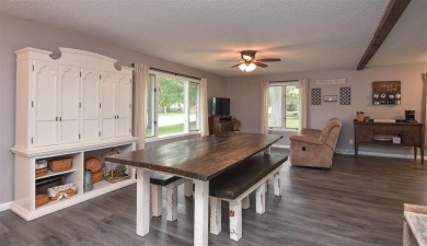 Spacious multi level home with a fantastic location less than a on Knoll Ridge Country Club in Iowa - for sale on GolfHomes.com, golf home, golf lot