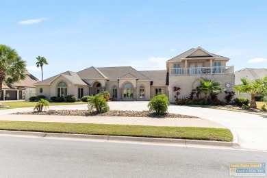 This beautifully designed lake front home is located in the on South Padre Island Golf Club in Texas - for sale on GolfHomes.com, golf home, golf lot