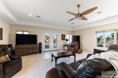 This beautifully designed lake front home is located in the on South Padre Island Golf Club in Texas - for sale on GolfHomes.com, golf home, golf lot