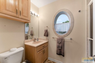 This beautifully designed lake front home is located in the on South Padre Island Golf Club in Texas - for sale on GolfHomes.com, golf home, golf lot