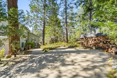 This home with 3 bedrooms, 2.5 baths, and a double car garage on Forest Meadows Golf Course in California - for sale on GolfHomes.com, golf home, golf lot