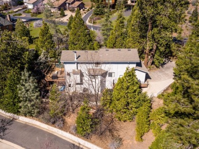 This home with 3 bedrooms, 2.5 baths, and a double car garage on Forest Meadows Golf Course in California - for sale on GolfHomes.com, golf home, golf lot