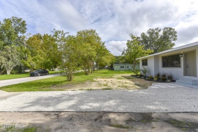 Situated on three lots, this prime Ormond Beach location is just on Riviera Country Club in Florida - for sale on GolfHomes.com, golf home, golf lot