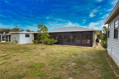 Welcome to this charming 2-bedroom, 2-bathroom home with a 2-car on Oyster Creek Golf Club in Florida - for sale on GolfHomes.com, golf home, golf lot