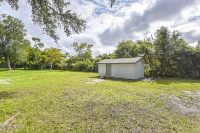 Situated on three lots, this prime Ormond Beach location is just on Riviera Country Club in Florida - for sale on GolfHomes.com, golf home, golf lot