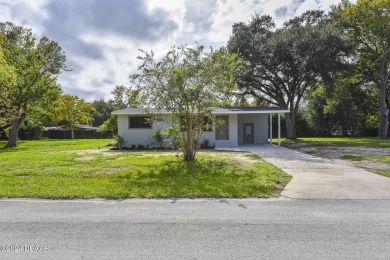 Situated on three lots, this prime Ormond Beach location is just on Riviera Country Club in Florida - for sale on GolfHomes.com, golf home, golf lot