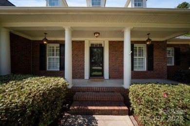 Nestled in the Birkdale community, this all-brick residence with on Birkdale Golf Club in North Carolina - for sale on GolfHomes.com, golf home, golf lot