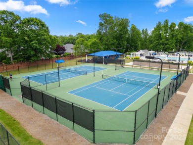 Nestled in the Birkdale community, this all-brick residence with on Birkdale Golf Club in North Carolina - for sale on GolfHomes.com, golf home, golf lot