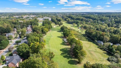 Nestled in the Birkdale community, this all-brick residence with on Birkdale Golf Club in North Carolina - for sale on GolfHomes.com, golf home, golf lot