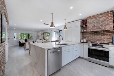 Experience luxury living in this stunning corner unit in Boca on Boca Lago Golf and Country Club in Florida - for sale on GolfHomes.com, golf home, golf lot