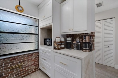 Experience luxury living in this stunning corner unit in Boca on Boca Lago Golf and Country Club in Florida - for sale on GolfHomes.com, golf home, golf lot