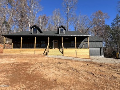 This brand new home is located just a minute from the Golf on Smoky Mountain Country Club in Tennessee - for sale on GolfHomes.com, golf home, golf lot