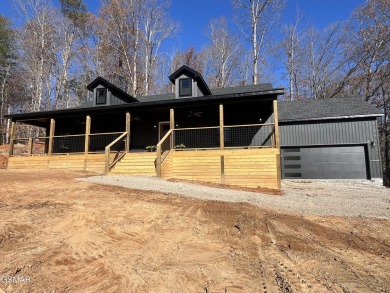 This brand new home is located just a minute from the Golf on Smoky Mountain Country Club in Tennessee - for sale on GolfHomes.com, golf home, golf lot