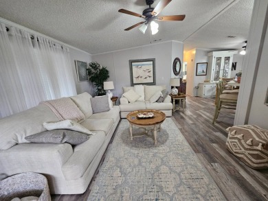 This immaculate 2-bedroom, 2-bath home has vinyl plank flooring on Big Cypress Golf and Country Club in Florida - for sale on GolfHomes.com, golf home, golf lot