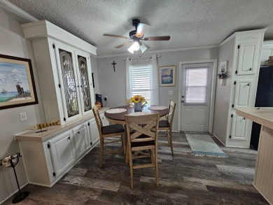 This immaculate 2-bedroom, 2-bath home has vinyl plank flooring on Big Cypress Golf and Country Club in Florida - for sale on GolfHomes.com, golf home, golf lot